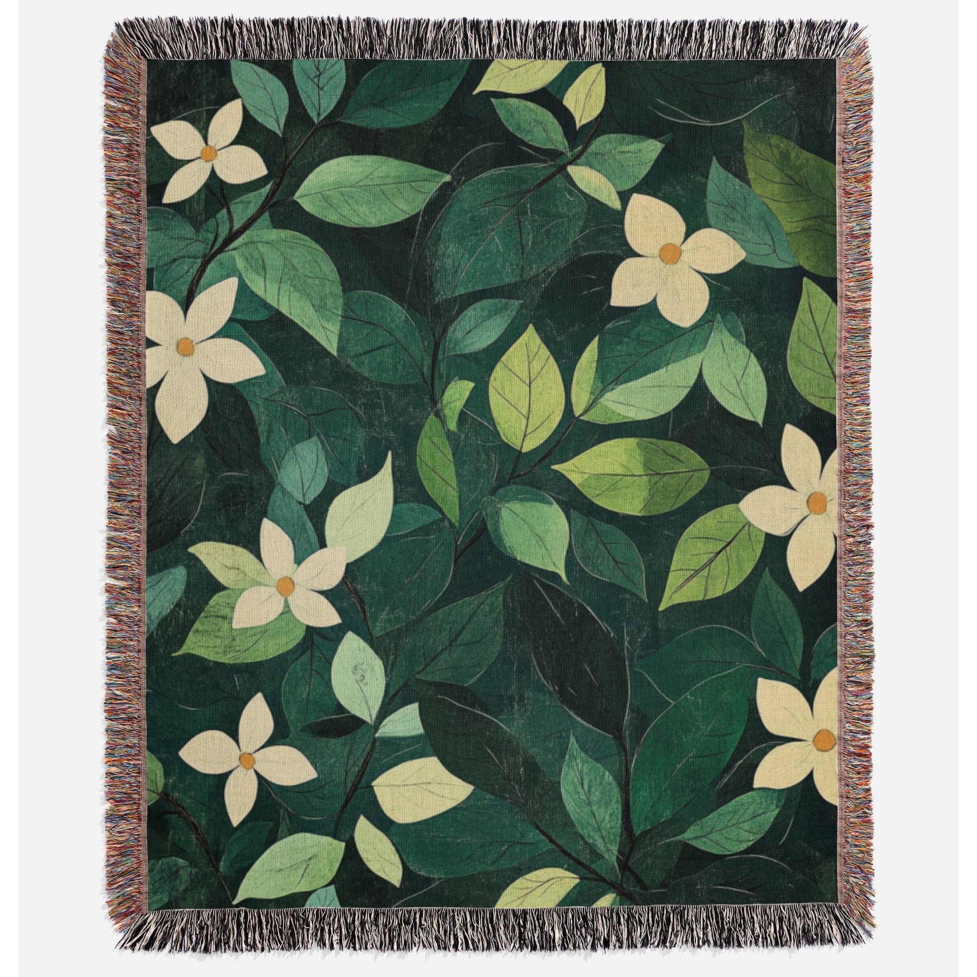 a green and yellow blanket with flowers on it