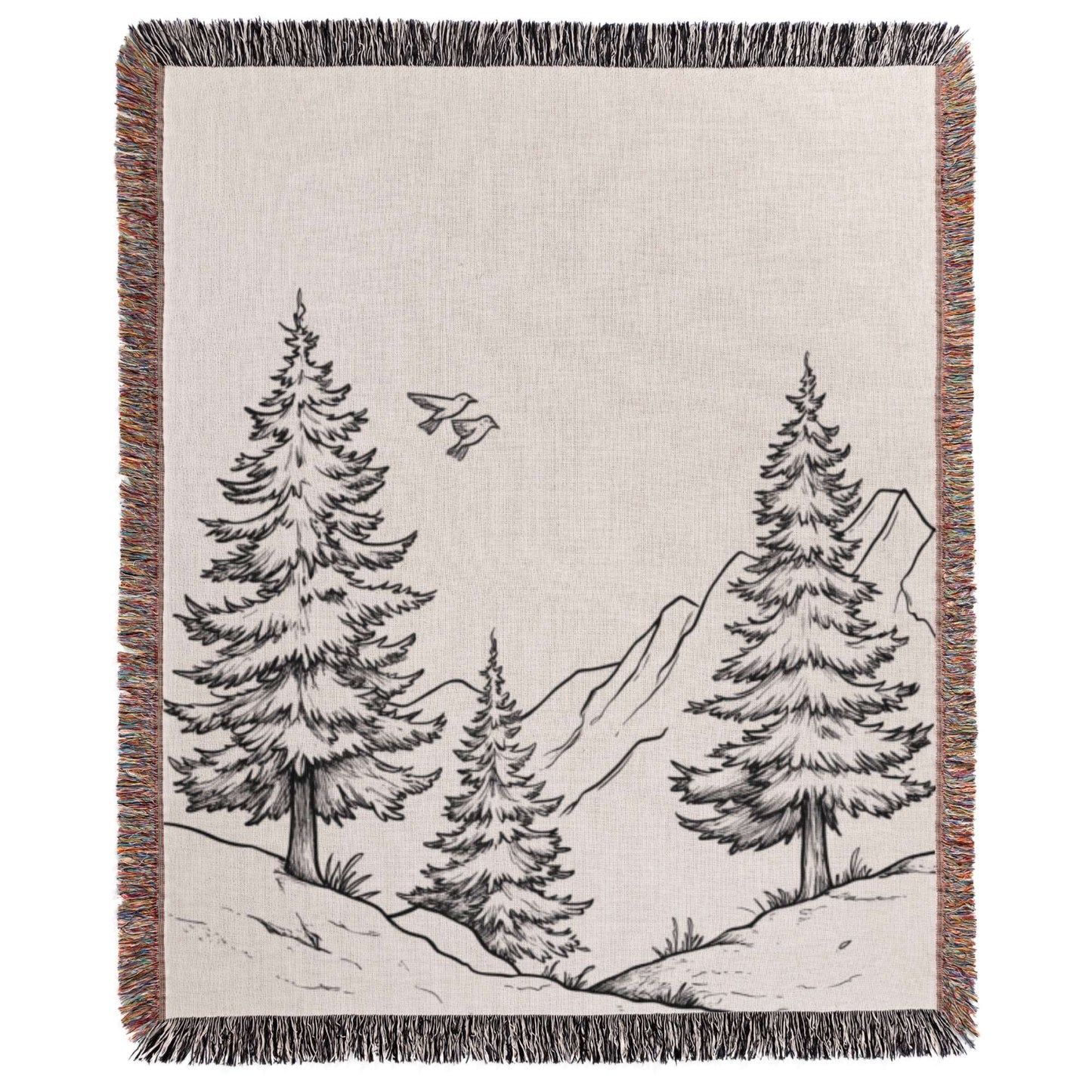 a black and white drawing of trees on a blanket