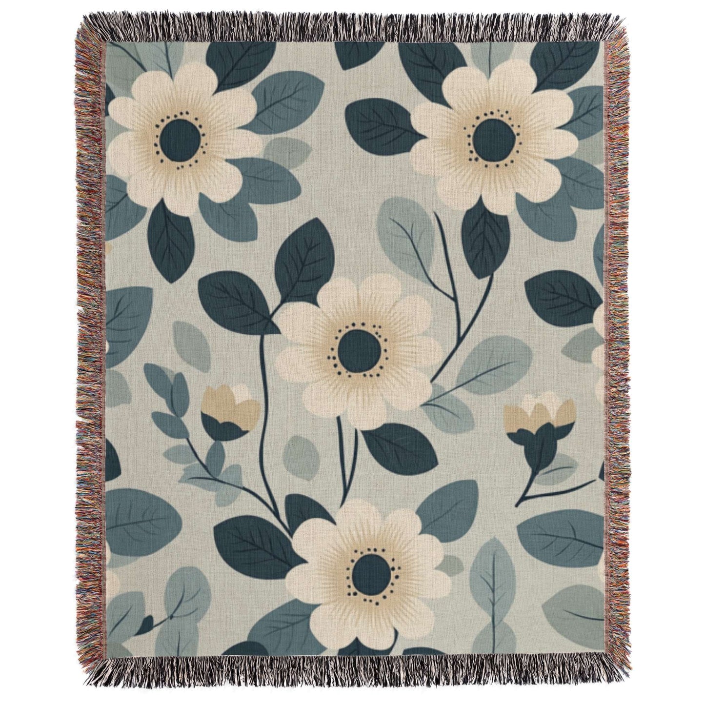 a blue and white blanket with flowers on it