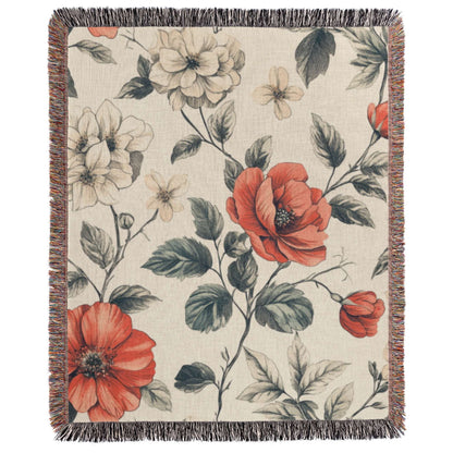 a red and white blanket with flowers on it