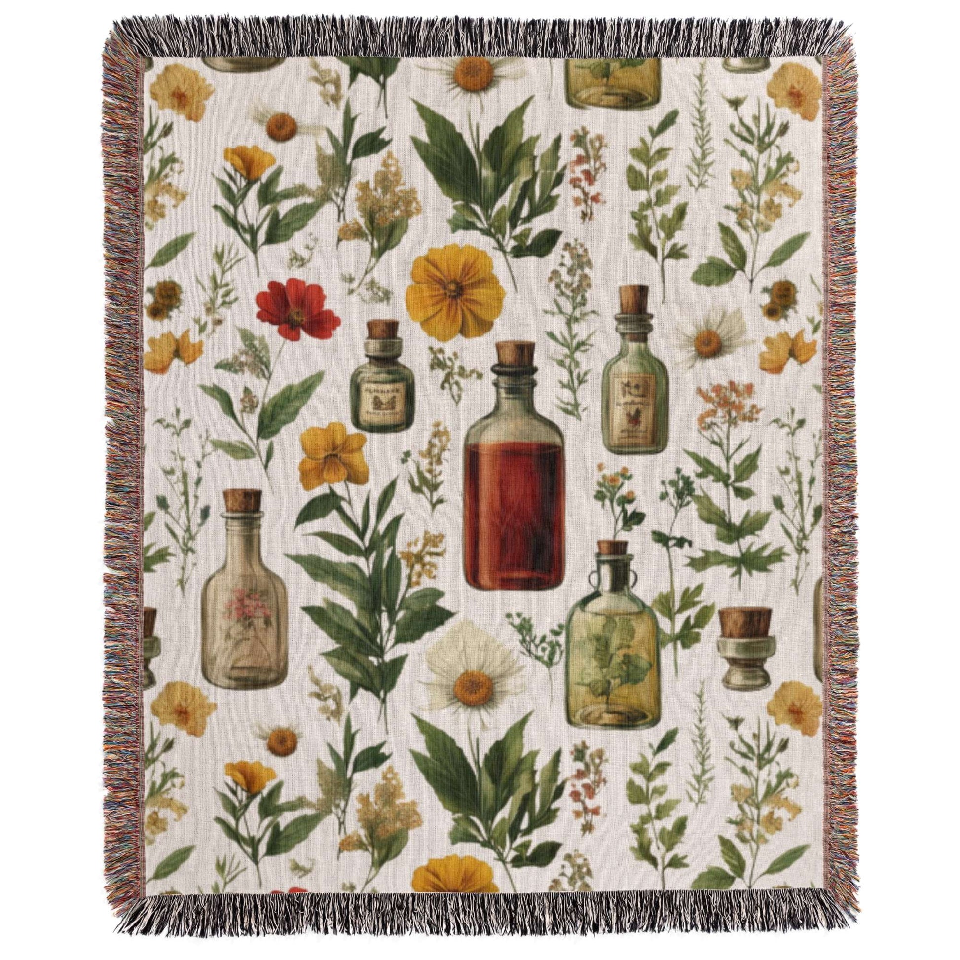 a blanket with a floral pattern and bottles on it