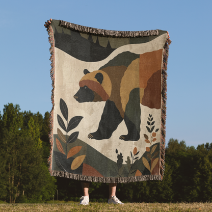 a person standing in front of a bear tapestry
