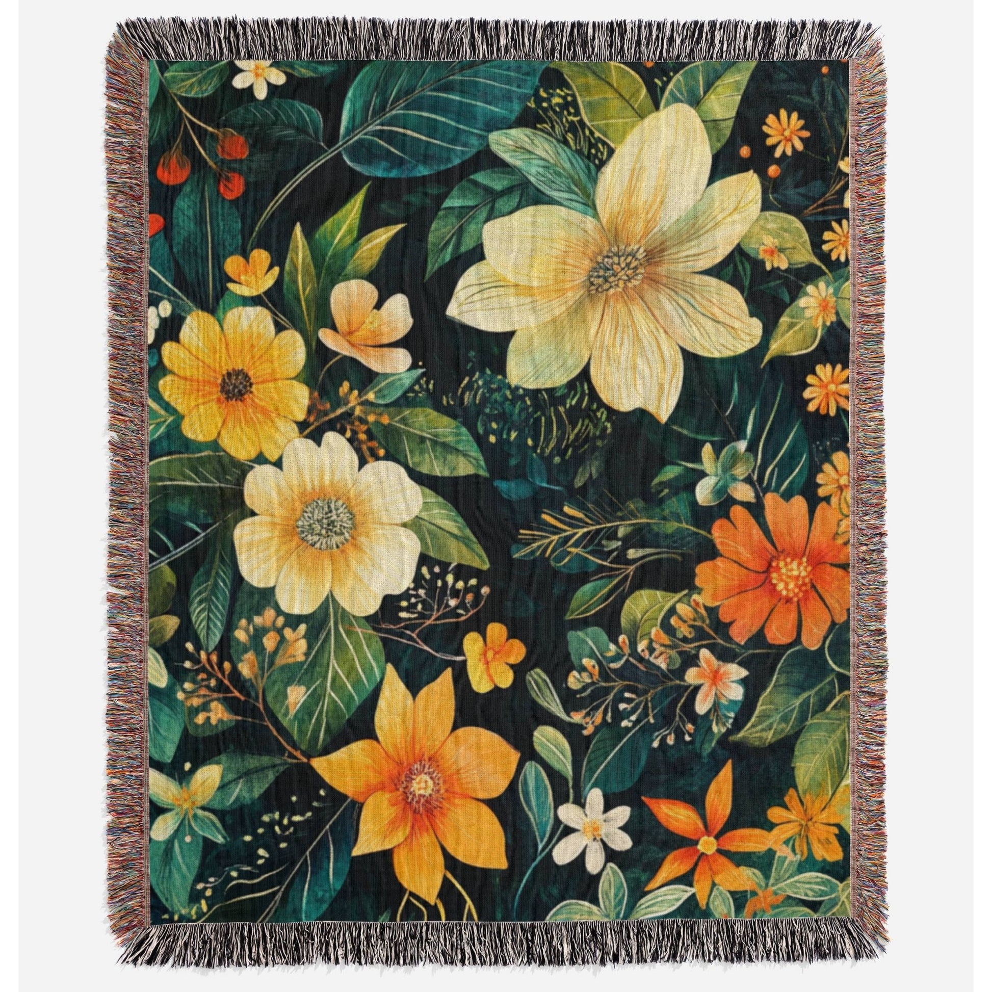 a blanket with flowers and leaves on it