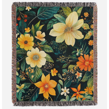 a blanket with flowers and leaves on it
