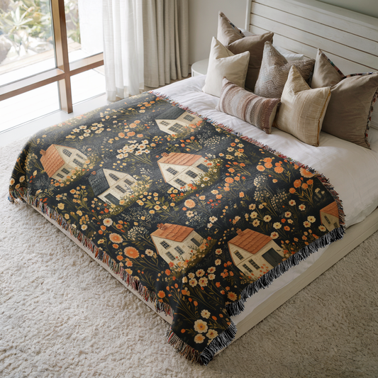 a bed with a blanket on top of it