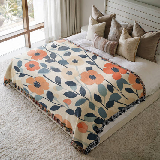 a bed with a blanket and pillows on top of it