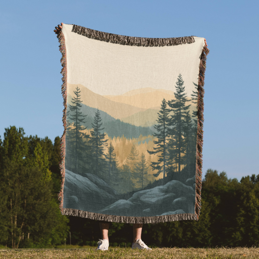 a person standing in a field holding a blanket